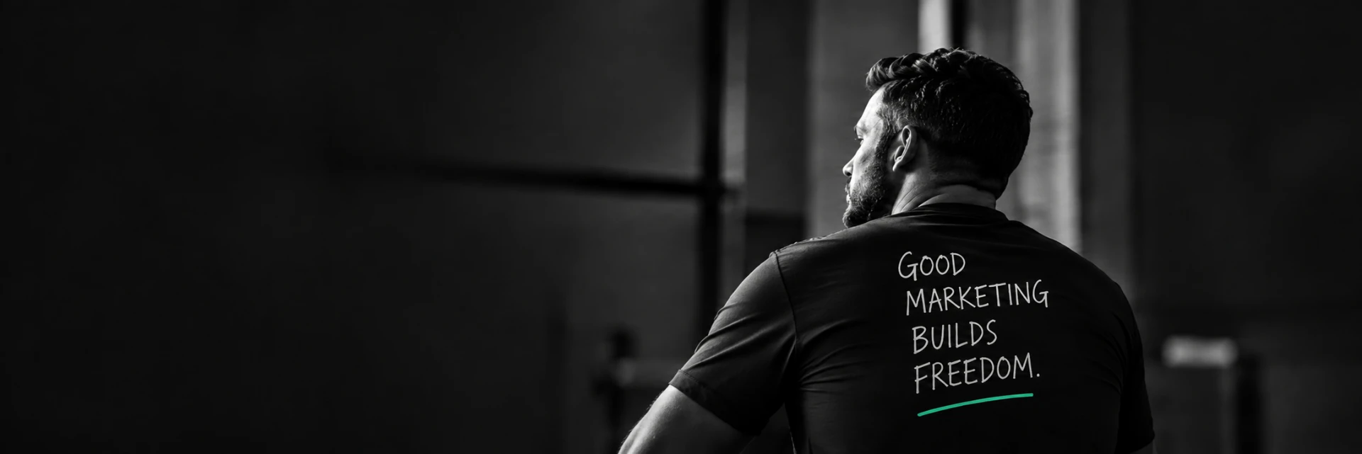 Gravity Co founder wearing a shirt that reads Good marketing builds freedom